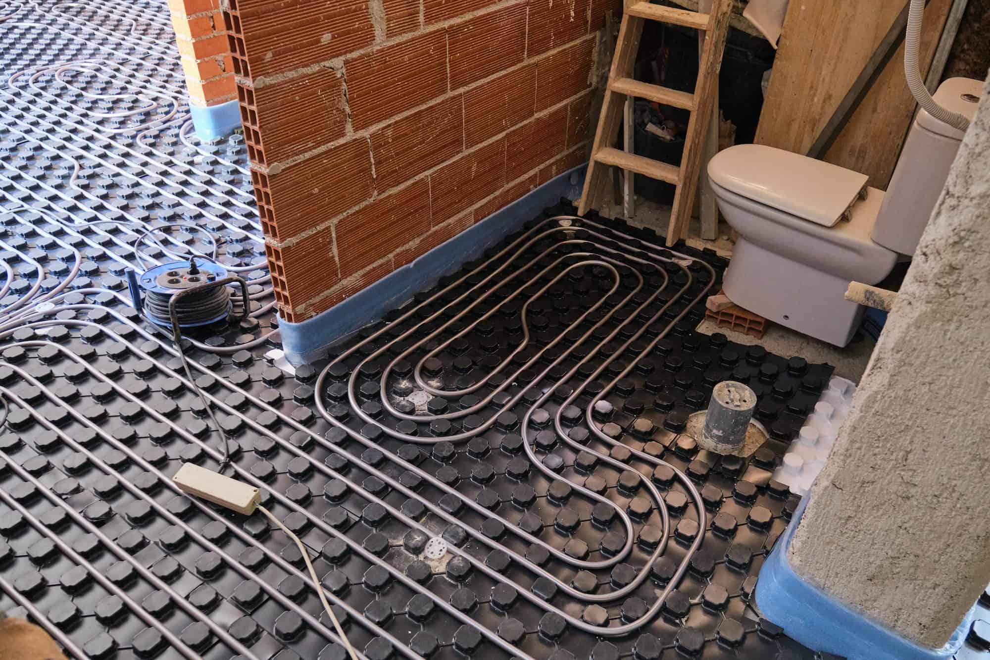 radiant-underfloor-heating-installation-in-a-bathroom-.jpg